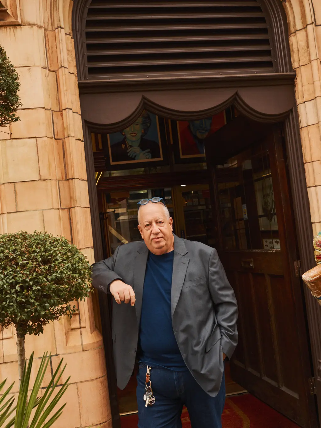 Laurence Davis stands in a shop doorway